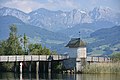 The wooden bridge, as seen from nearby Seedamm, Obersee and Wägital in the background