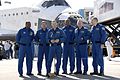 Commander Charles Hobaugh speaks on the tarmac