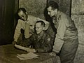 Captain Ernest Price preparing to announce surrender of Japanese forces in China, 25 Oct 1945