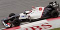 Kamui Kobayashi pilotando a Sauber C31 no Grande Prêmio da Malásia de 2012.