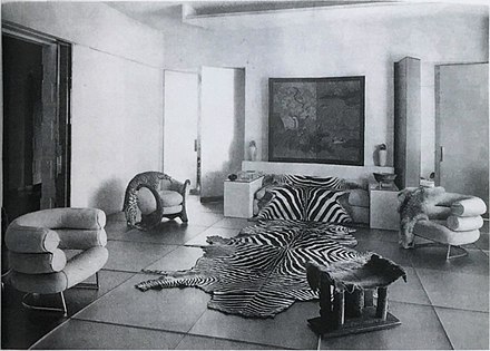 Salão de Vidro (Le Salon de Verre) desenhado por Paul Ruaud com mobília de Eileen Gray, para Madame Mathieu-Levy (modista da boutique J. Suzanne Talbot), 9, rue de Lota, Paris, 1922 (publicado em L'Illustration, 27 de maio de 1933)