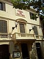 Façana de l'Escola Municipal de Música L'Oriola vista des de la Plaça del Poble