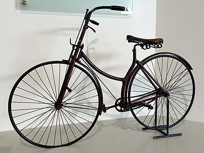 1886 Rover safety bicycle at the British Motor Museum. The first modern bicycle, it featured a rear-wheel-drive, chain-driven cycle with two similar-sized wheels. Dunlop's pneumatic tire was added to the bicycle in 1888.