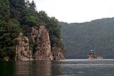 Sanjiaolong Crater Lake in the Longwanqun National Forest Park, Huinan County