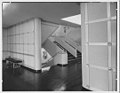 An onboard stairway, with an aluminum sculpture of the Great Seal of the United States on each landing.: 93