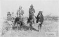 Image 34"Geronimo's camp before surrender to General Crook, March 27, 1886: Geronimo and Natches mounted; Geronimo's son (Perico) standing at his side holding baby." By C. S. Fly. (from Photojournalism)