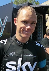 A man wearing a black jersey.