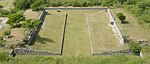 One of the ballcourts at Xochicalco. Note the characteristic -shape, as well as the rings set above the apron at center court. The setting sun of the equinox shines through the ring.[11]