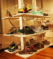 A display shelf of sneakers.