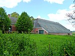 Leegstaande boerderij in Weiwerd