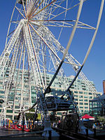 Four-car 30 m tall drive-in Ferris wheel at Harbourfront, Toronto, Canada, in 2004[184]