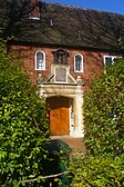 Monoux Almshouses in the village