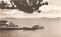 America and West Indies Station 1st Division (HMS Dragon, HMS Danae and HMS Despatch) off Admiralty House in 1931 as they depart the Royal Naval Dockyard to exercise on the open ocean