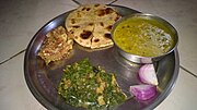 Litti, dal, and choka with saag