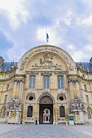 The northern portal of the complex, with Louis XIV with a horse on the pediment