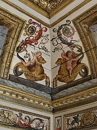 Baroque putti painted on the boiserie of a room from the Hôtel Colbert de Villacerf, now in the Musée Carnavalet, Paris, unknown architect, sculptor and painter, c. 1650[12]