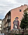 Mural poświęcony Andrzejowi Bieniaszowi, muzykowi Püdelsów. Kraków ul. Koletek 8