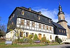 Pfarrhaus und Kirche in Wildbach