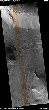 Lineated valley fill in valley, as seen by HiRISE under HiWish program. Linear valley flow is ice covered by debris.