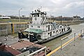 Towboat Enid Dibert departing main lock at McAlpine Locks, 1999