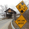 Signage posted ahead of the Holmes Creek Bridge on Lake Rd., Charlotte, VT (looking North)