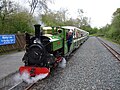 Image 43Ruislip Lido Railway's 12-inch (300 mm) gauge locomotive "Mad Bess" hauling a passenger train.