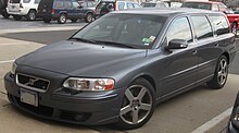 Front drivers side view of a gray post facelift V70 R in a parking spot