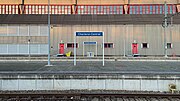 Place name sign on a platform