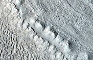 Enlargement of area in rectangle of the previous image. Interpreted as the terminal moraine of a glacier. Picture taken with HiRISE under the HiWish program. Image from Ismenius Lacus quadrangle.