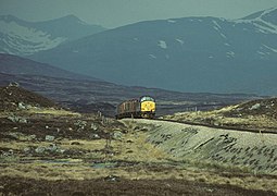 A freight train heading south on the West Highland Line