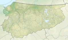 Mapa konturowa województwa warmińsko-mazurskiego, blisko górnej krawiędzi nieco na lewo znajduje się punkt z opisem „źródło”, natomiast blisko górnej krawiędzi po lewej znajduje się punkt z opisem „ujście”