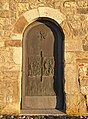 Bronzetür am Portal der Kirche San Donato in Valle in Moimacco mit der Legende des hl. Donatus