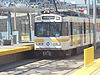 A train arriving at Jefferson/USC station