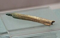 Bronze awl with bone handle.Probably derived from the Seima-Turbino culture.[8]