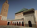 The central courtyard of the Zawiya of Sidi Bel Abbes. The mausoleum is on the right and the minaret of the complex stands on the left.