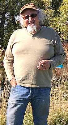 Songwriter Kostas in an outdoor setting