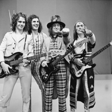 Slade in 1973. Left to right: Jim Lea, Don Powell, Noddy Holder, Dave Hill