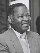 Portrait of Peter Mmusi smiling