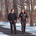 Prime Minister Tony Blair and President George W. Bush walking at Camp David, 2001