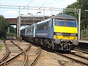 Number 90006 passing Marks Tey railway station