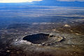 Image 18Meteor Crater in Arizona. Created 50,000 years ago by an impactor about 50 metres (160 ft) across, it shows that the accretion of the Solar System is not over. (from Formation and evolution of the Solar System)