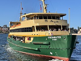 Freshwater departs Circular Quay displaying her opened upper deck seating areas. These were opened in the early 2000s.