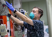 Person wearing a surgical N95 respirator