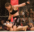 Image 8Gina Carano applying a ground-and-pound on her opponent (from Mixed martial arts)