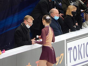 Coaches Alexander Volkov (left) and Alexei Mishin (center)