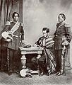 Image 32Malagasy Embassy to Europe in 1863. Left to right: Rainifiringa Ralaimaholy, Rev. John Duffus and Rasatranabo aka Rainandrianandraina. (from History of Madagascar)