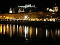 The fortress (background), Salzburg Cathedral (middle), and the Salzach (foreground)