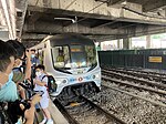 E71-E112 prepares to depart Sha Tin station for the final time on 6 May 2022