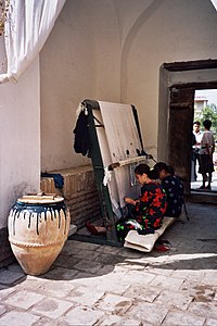 Tabriz loom in a carpet workshop in Khiva, Uzbekistan, 2004