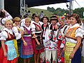 Prešov area Lemkos (left side) and Przemyśl area Ukrainians in traditional attire. Photo: Village Mokre near Sanok. 2007